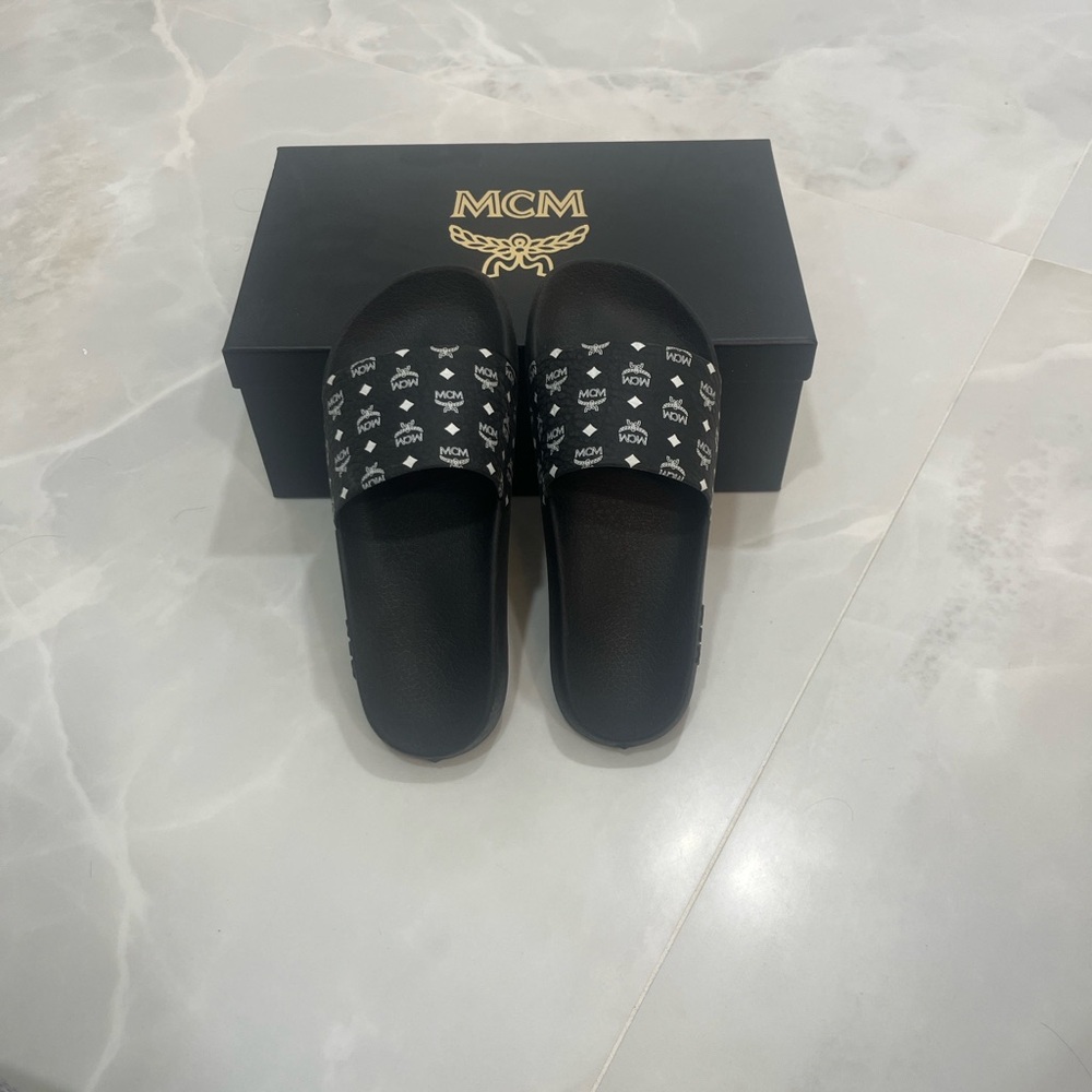 MCM Women’s Logo Slides